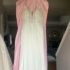 Essence of Australia new never worn tags still wedding gown.
